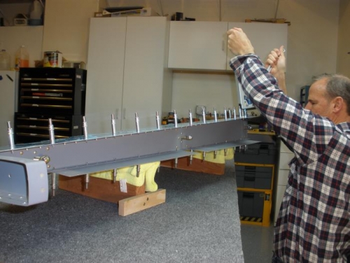 Riveting along the rudder leading edge spar.