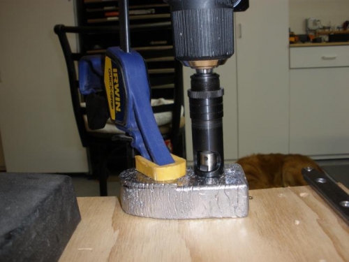 drill countersink the counterbalance weight.