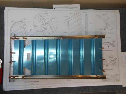 Front seatback and hinge assembled.