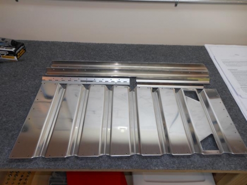 Front seatback parts ready for primer.