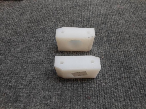 Flap bearing blocks trimmed and drilled.