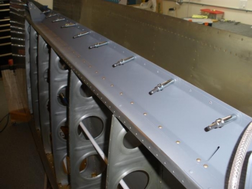 Aileron Gap Fairing riveted to rear spar.