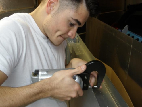 Parker dimpling the trailing edge skin.