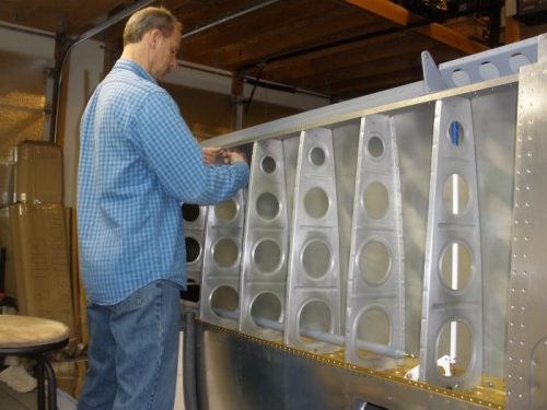 Deburing the wing structure.