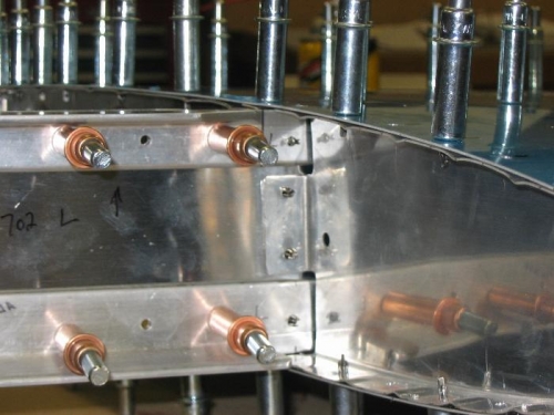 Inboard Rib Attach Holes Drilled Thru Front Spar.