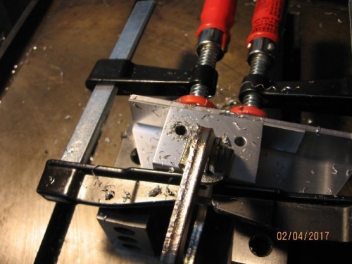 Parts clamped together and up-drilling to 