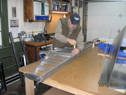 De-burring the stabilizer frame.