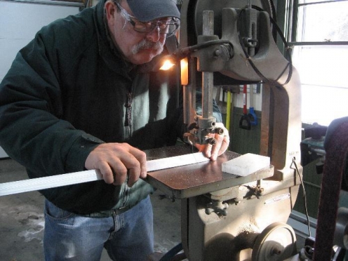 Cutting aluminum angle on the bandsaw.