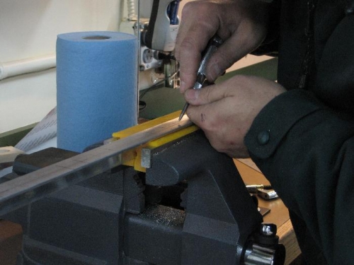 Center punching the holes to make them as accurate as possible.