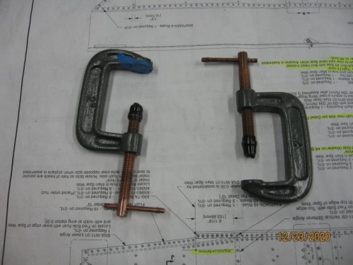 Modified C-clamps to allow for clamping in tight spaces.