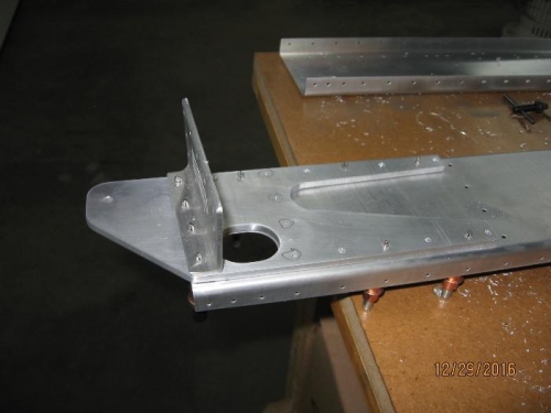 Attach plate and root rib attach angle cleco'd to rear spar channel.