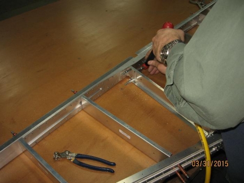 Using the tight-fit attachment to drill holes.