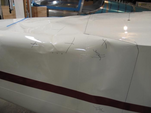 Asses left fuselage damage
