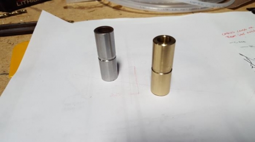 New bushing on the right.  It's not steel like the original, but has a lot of nickel in it.