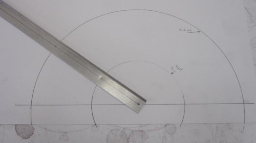 Paper tempate of prop hub centered in spinner diameter.