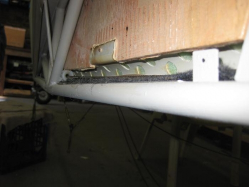 PVC channel for rudder control cable showing attachment lug