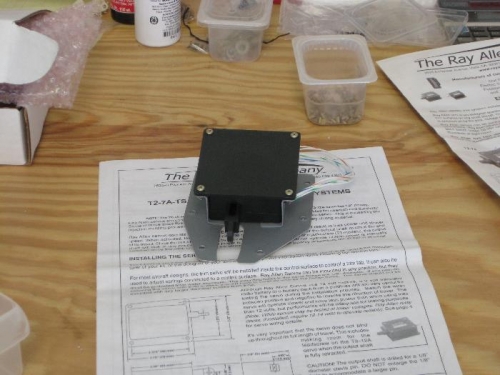 Trim motor on access panel