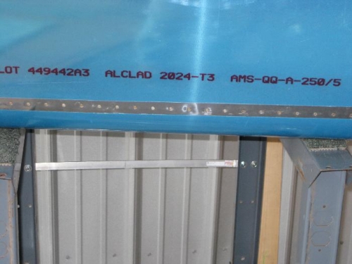 Looks like a dent in the middle, just the reflection from the flash