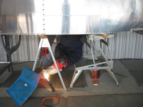 Me under the canoe bucking rivets