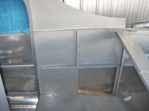 Left baggage compt wall.