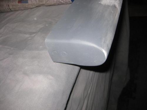 Right tip with tape still covering the weight bolt heads