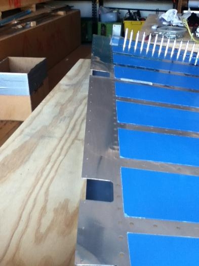 Right rudder skin riveted to spar