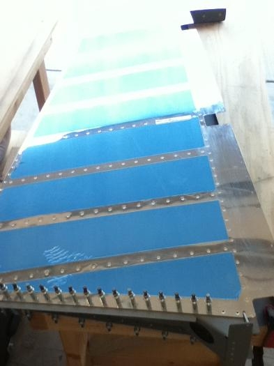 Set up for skin to rib to bottom attach strip