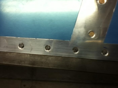 rivets set 1/2 way in working across