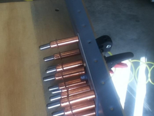 Clamped and first rivet squeezed