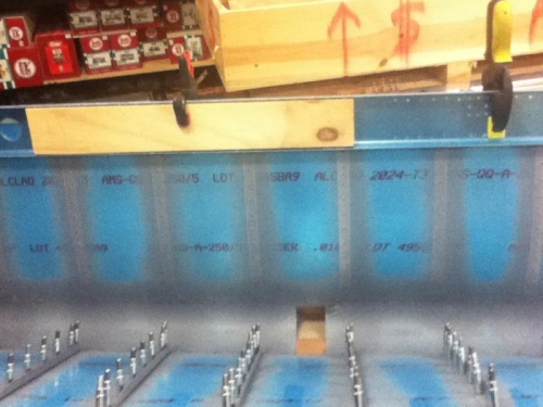 Simply pull down and back rivet.