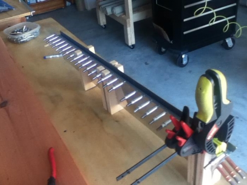 Realized here that I should have already drilled out the hinge.