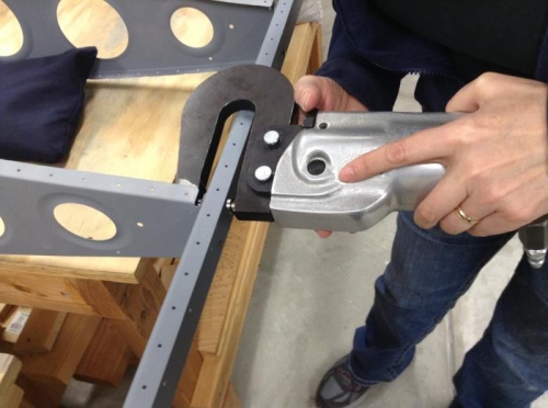 Squeezing all rivets on rear spar