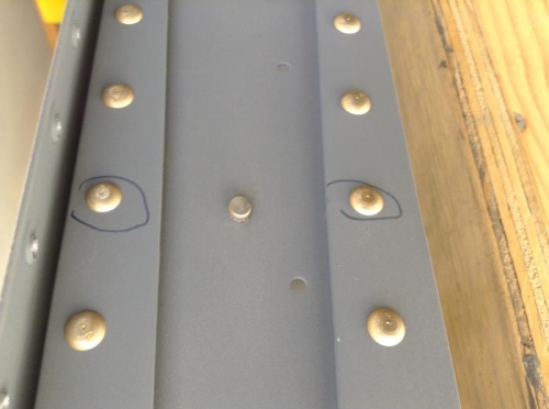 Middle rivet is correct - shop head out