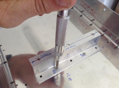 Punch out center pin