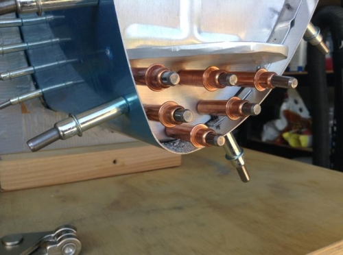 Drilled in place to tank rib