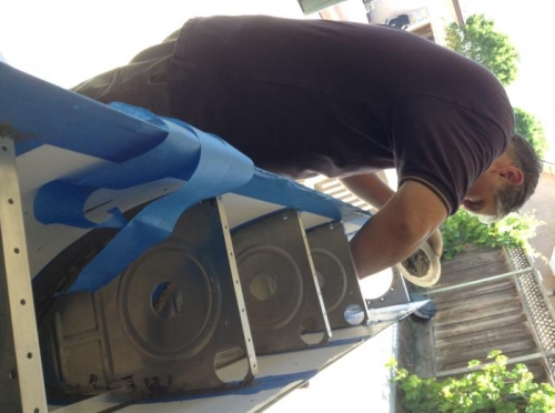 touching up corners and rivet heads.