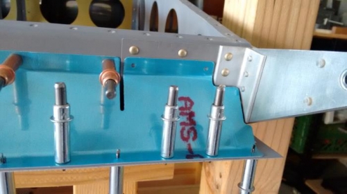 Two more holes to drill through spar