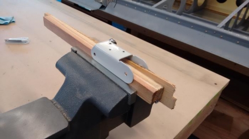 Drill hole in bracket