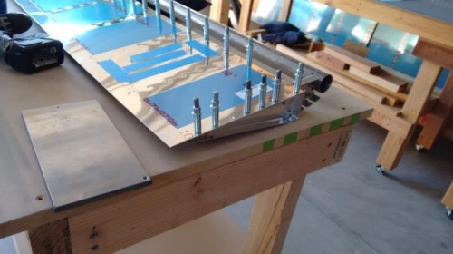 Dimpled and tem riveted