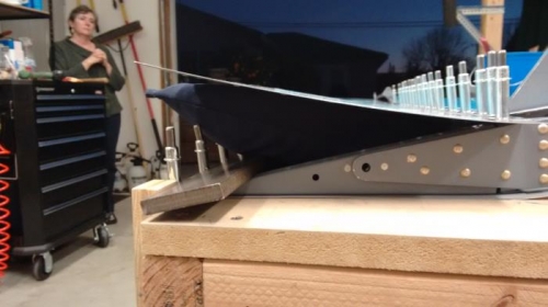 Back rivet bar helping hold things down