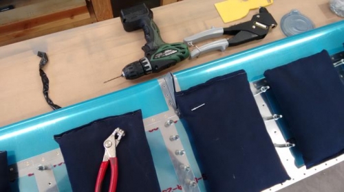 Drill and pop rivet center out