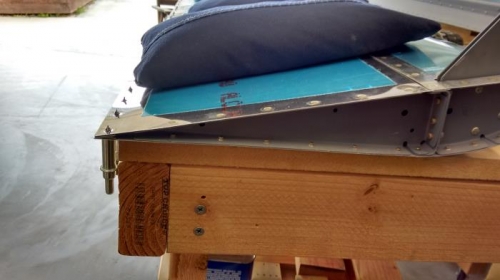 End rib squeezed / driven