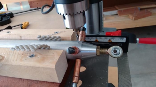 Last hole in large tube, clecos