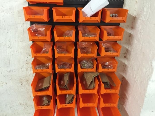Small parts stored in numbered bins