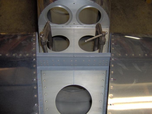 Clamp to the aft fuselage deck. (forward view)