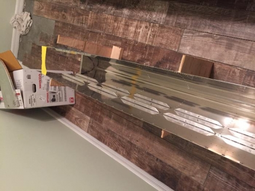 Began riveting other fuel tank together