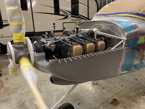 Hinge line to attach top and bottom cowlings