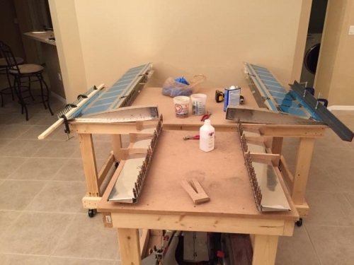 Trailing edges of elevators and trim tabs prepped and glued today