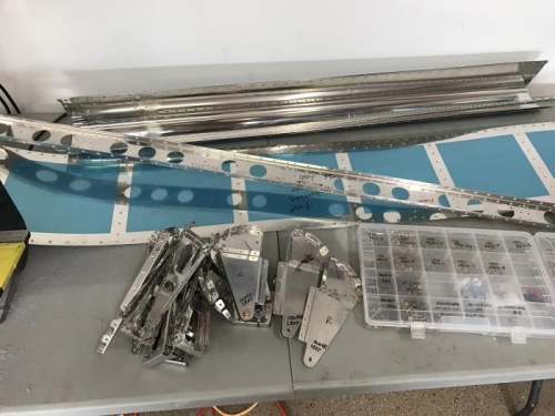 L flap deburred, dimpled, countersunk, and riveting began