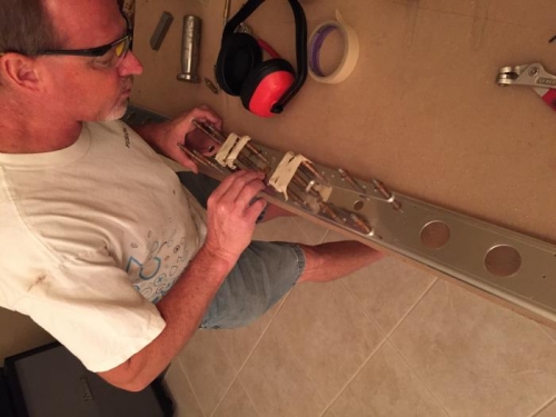 Deburred, drilled, and began riveting aft spar of horizontal stabilizer